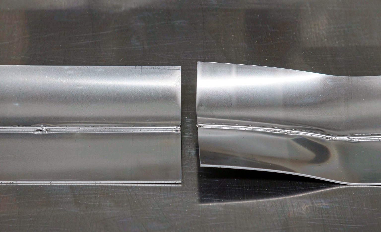 Laser Welding vs TIG/MIG: Speed, Heat Input and Distortion Laser-welded sheet flat versus traditionally welded sheet warped